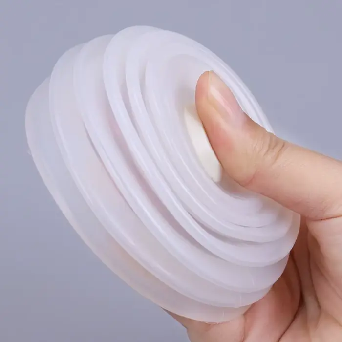 Dispositif anti-poussière avec 4 bandes de caoutchouc