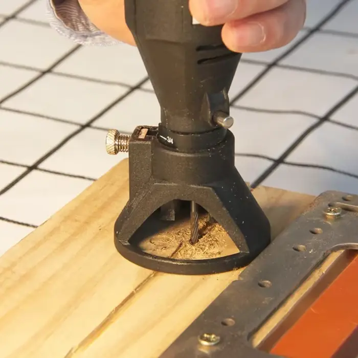Guide de fixation pour fraise rotative