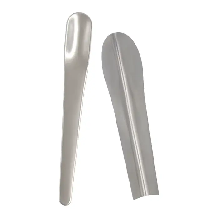 Truelle d'angle ergonomique pour le plâtrage mural