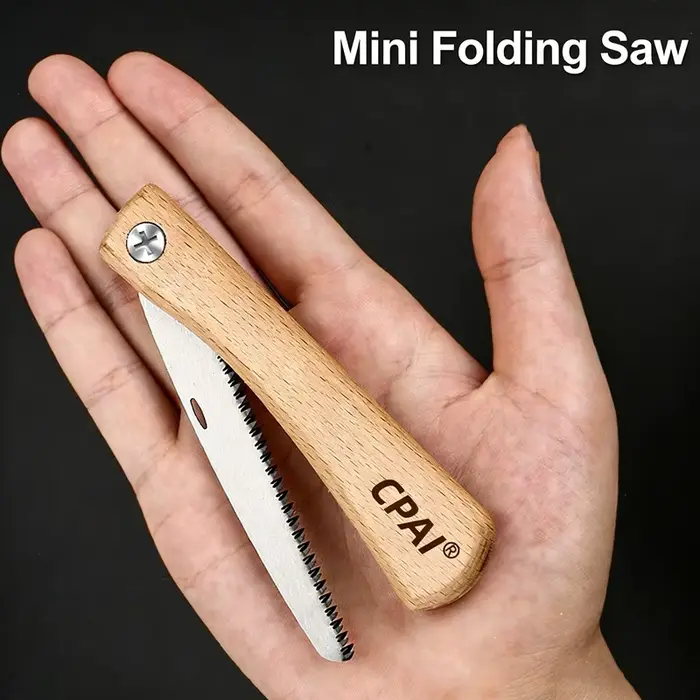 Mini scie pliante avec manche en bois de noyer